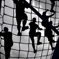 climbing a rope wall